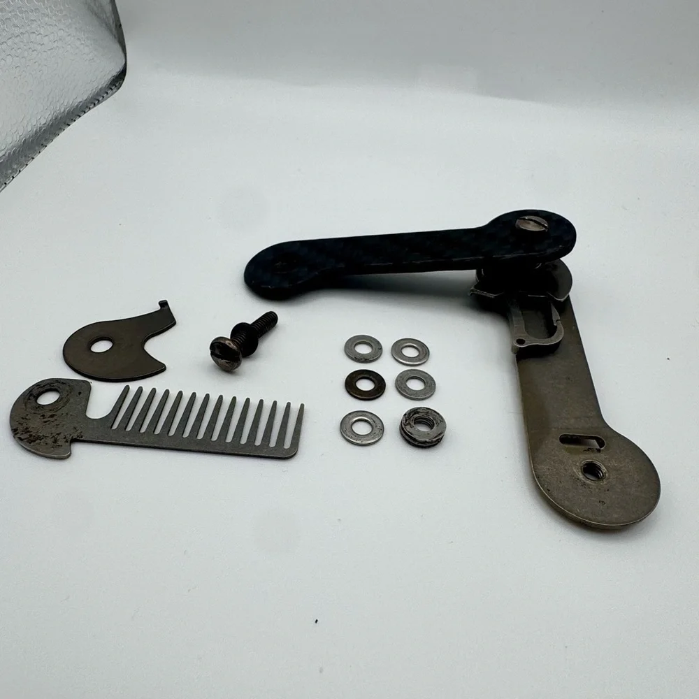 Black Carbon Fiber and Silver Titanium Key Holder by KeyBar